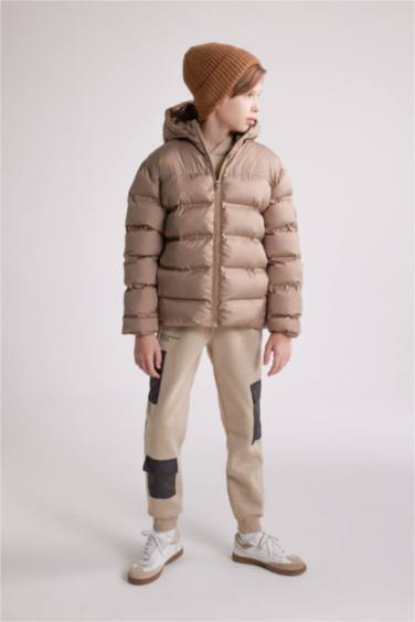 جاكيت دودون طارد للماء بغطاء للرأس