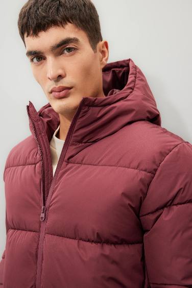 قمصلة نفخ قصة عادية بغطاء للرأس