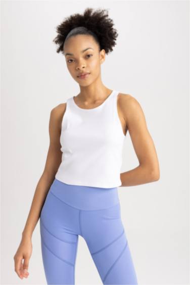 كروب توب برقبة مستديرة بدون أكمام من DeFactoFit