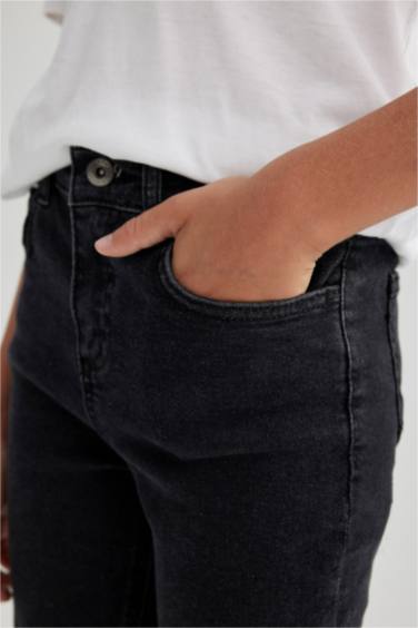 بنطلون جينز اولادي سكيني فيت جينز برجل ضيق