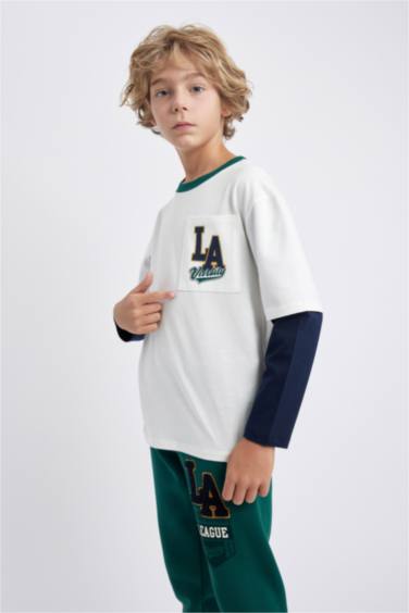 تيشيرت اوفر سايز كم طويل برقبة مستديرة