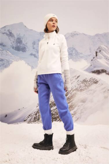 بنطلون سويت بانتس بأستك من تحت بطبعة شعار قصة عادية بجيوب أزرق فاقع من DeFactoFit