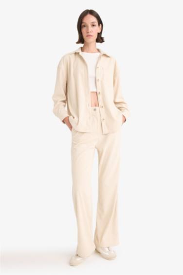 Pantalon en velours côtelé à taille haute et jambes larges Coupe droite