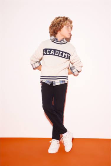 بلوفر تريكو اولادي قطن قصة عادية بكابيشون