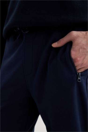 Штаны приталенного кроя