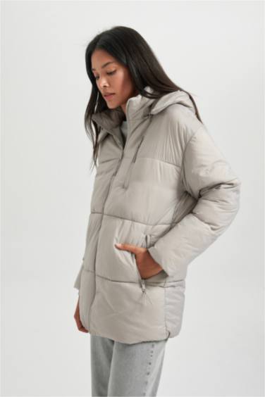 قمصلة نفخ قصة مريحة بغطاء للرأس مقاوم للماء