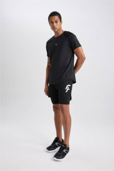 شورت محكم سليم فيت بجيب من DeFactoFit