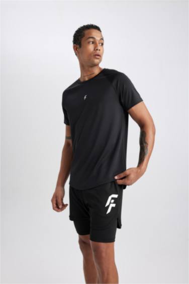 شورت محكم سليم فيت بجيب من DeFactoFit