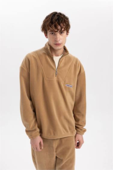 سويت شيرت قطيفة قصة مريحة برقبة مستديرة