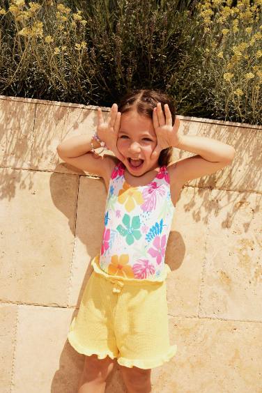 شورت بيبي بناتي أصفر وافل قصة عادية