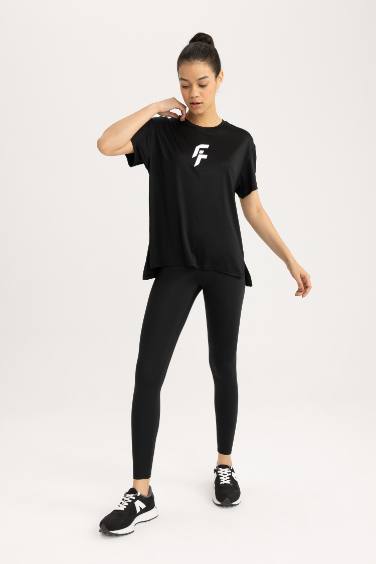 T-Shirt de sport à manches courtes et col rond Coupe Standard