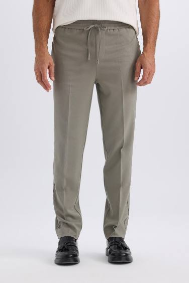 Pantalon droit avec poches et taille élastique