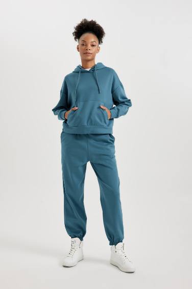 سويت شيرت رياضي نيلي بكابيشون بجيب من DeFactoFit