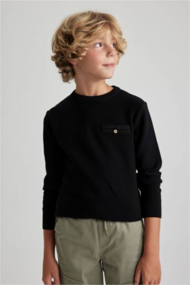 بلوفر تريكو اولادي قصة عادية برقبة مستديرة