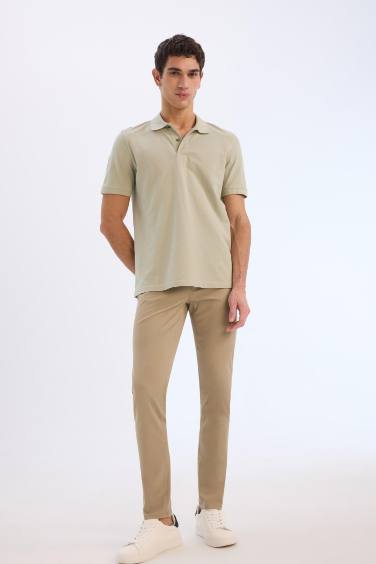 Pantalon chino slim en gabardine avec poches