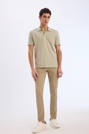 Pantalon chino slim en gabardine avec poches