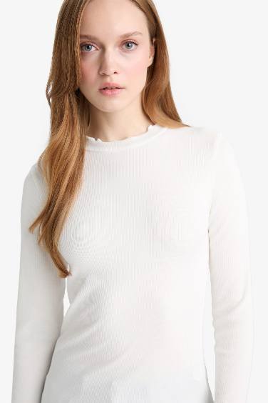 بلوزة ردن طويل مضلع بياخة عالية