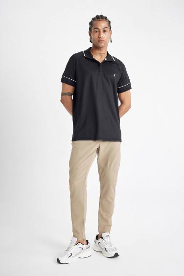 بنطرون بجامة رياضي جوجر منسوج سليم فيت بسحاب بجيب من DeFactoFit