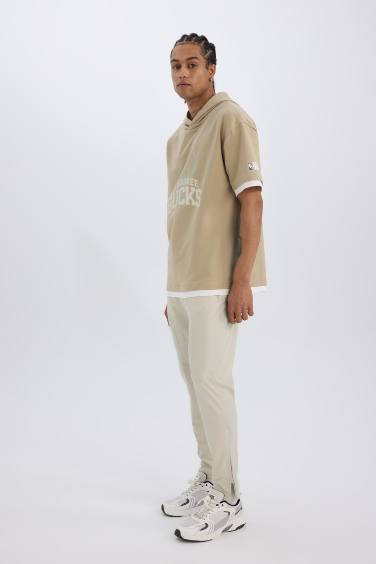 DeFactoFit Esnek Kumaş Sporcu Jogger Eşofman Altı Slim Fit Dar Kesim Dokuma Üç Cepli Fermuarlı Paça