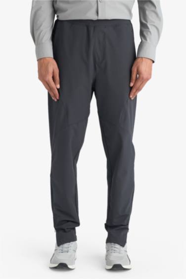 Slim Fit Dar Kesim Çift Cepli Fermuarlı Paça Dokuma Jogger