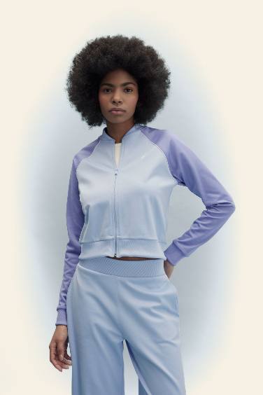 سويتر بيكة قصة عادية بجيب مزدوج من DeFactoFit