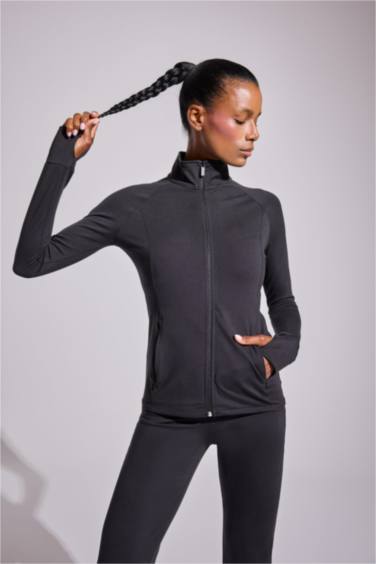 DeFactoFit Fitted Vücuda Oturan Ultra Soft Dik Yaka Çift Cepli Parmak Detaylı Fermuarlı Spor Hırka