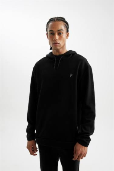 سويت شيرت قصة عادية بغطاء للرأس من DeFactoFit