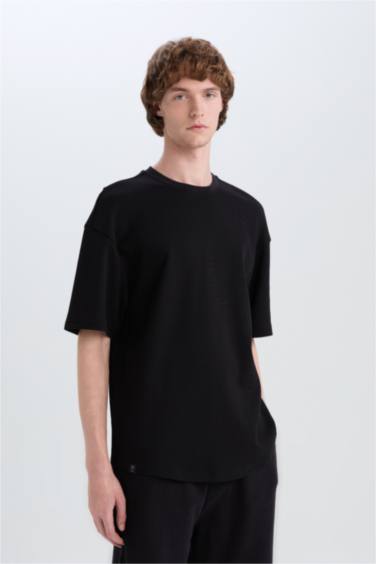 تيشيرت بيزك اوفر سايز وافل برقبة مستديرة