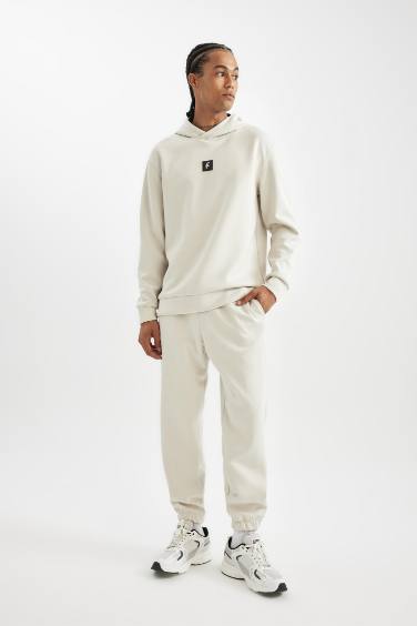 سويت شيرت رياضي قصة عادية قماش سكوبا من DeFactoFit