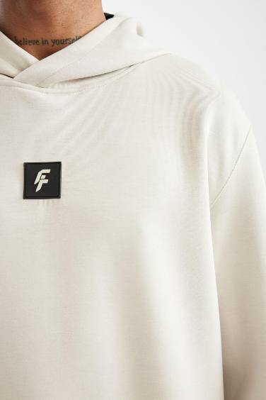 سويت شيرت رياضي قصة عادية قماش سكوبا من DeFactoFit