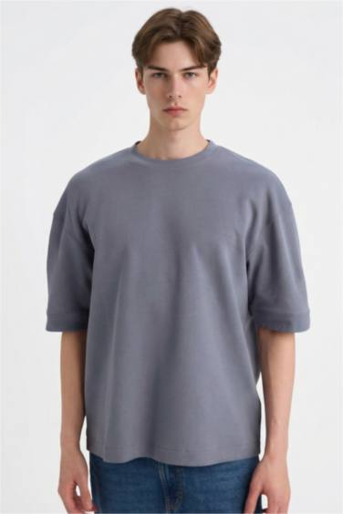 Ауа өткізетін матадан тігілген футболка