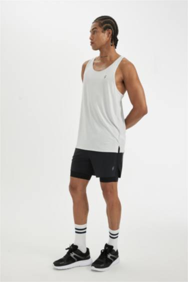 شورت محكم سليم فيت بجيب من DeFactoFit