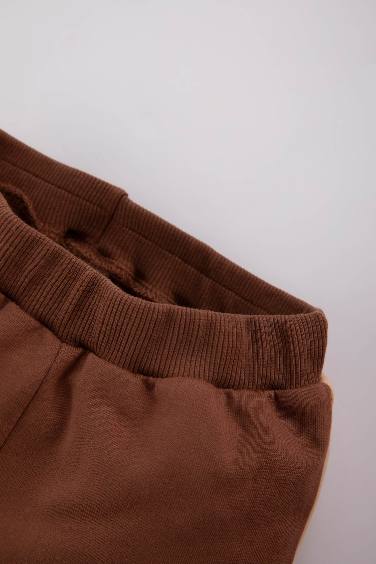 بنطلون سويت بانتس بيبي اولادي خفيف قصة عادية بني فاتح