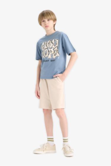 Short en piqué à poches et taille élastique pour garçon