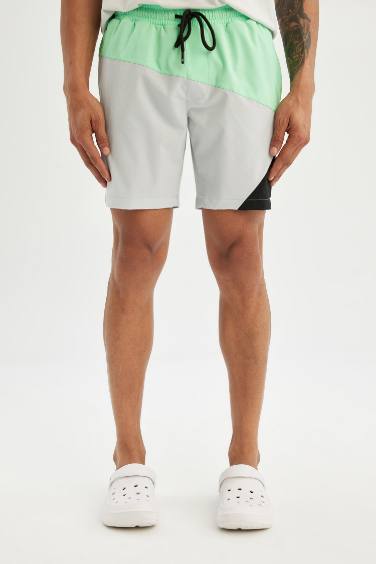 شورت بحر قصير قصة عادية ملون محكم من DeFactoFit