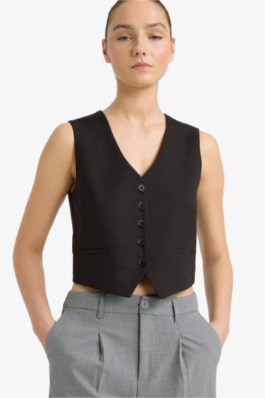 Gilet noir à boutons