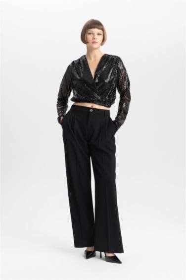 بلوزة كم طويل بالترتر وقصة عادية