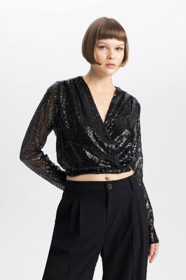 بلوزة كم طويل بالترتر وقصة عادية