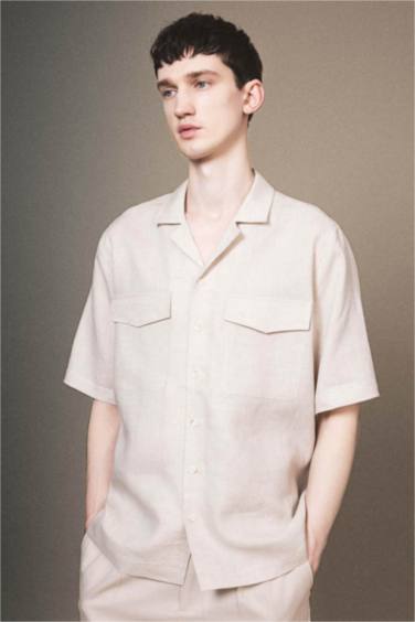 قميص بولو كتان بيج نص كم قصة مريحة