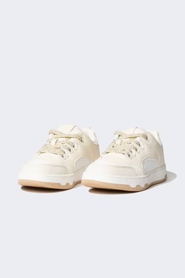 سنيكرز نسائي جلد صناعي بكعب مسطح برباط