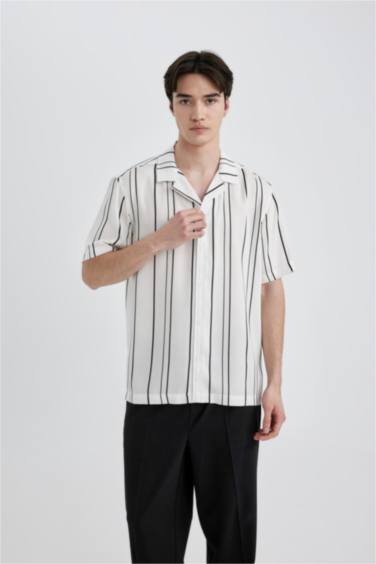 قميص مخطط قصة عادية بياخة عالية