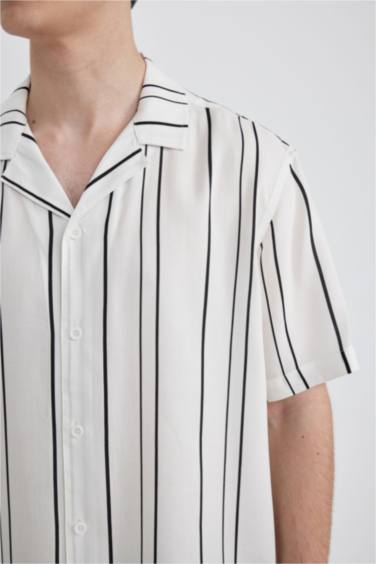 قميص مخطط قصة عادية بياخة عالية