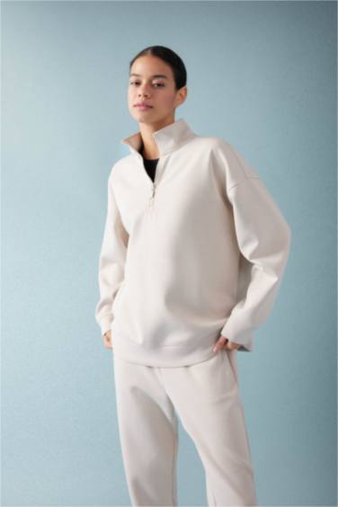 سويت شيرت رياضي اوفر سايز بياخة عالية بنصف سحاب من DeFactoFit