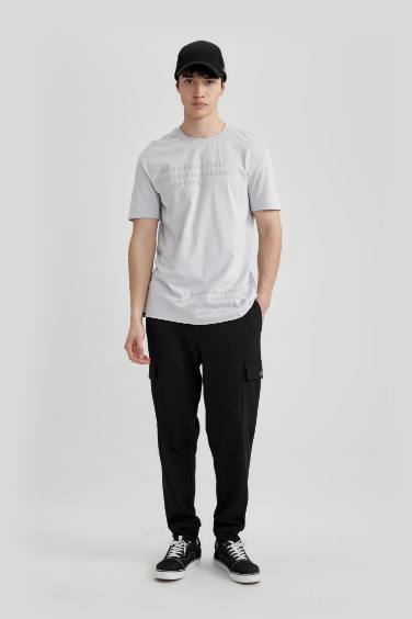 تيشيرت نص كم قصة عادية برقبة مستديرة