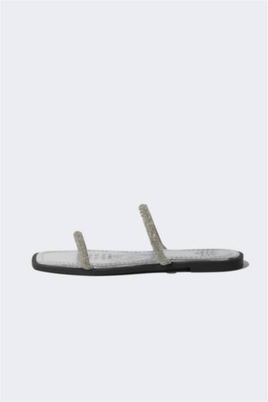 شبشب حريمي جلد صناعي بكعب مسطح