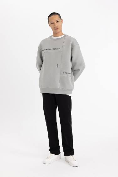 سويت شيرت مطبوع اوفر سايز برقبة مستديرة