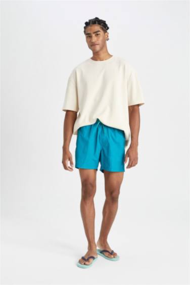 شورت بحر قصير ببطانة شبكية