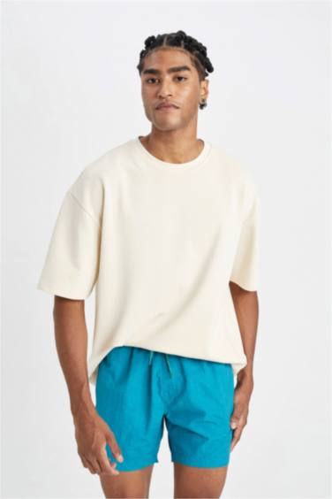 شورت بحر قصير ببطانة شبكية