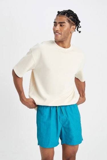 شورت بحر قصير ببطانة شبكية