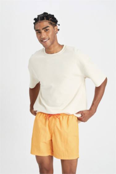 شورت بحر قصير ببطانة شبكية